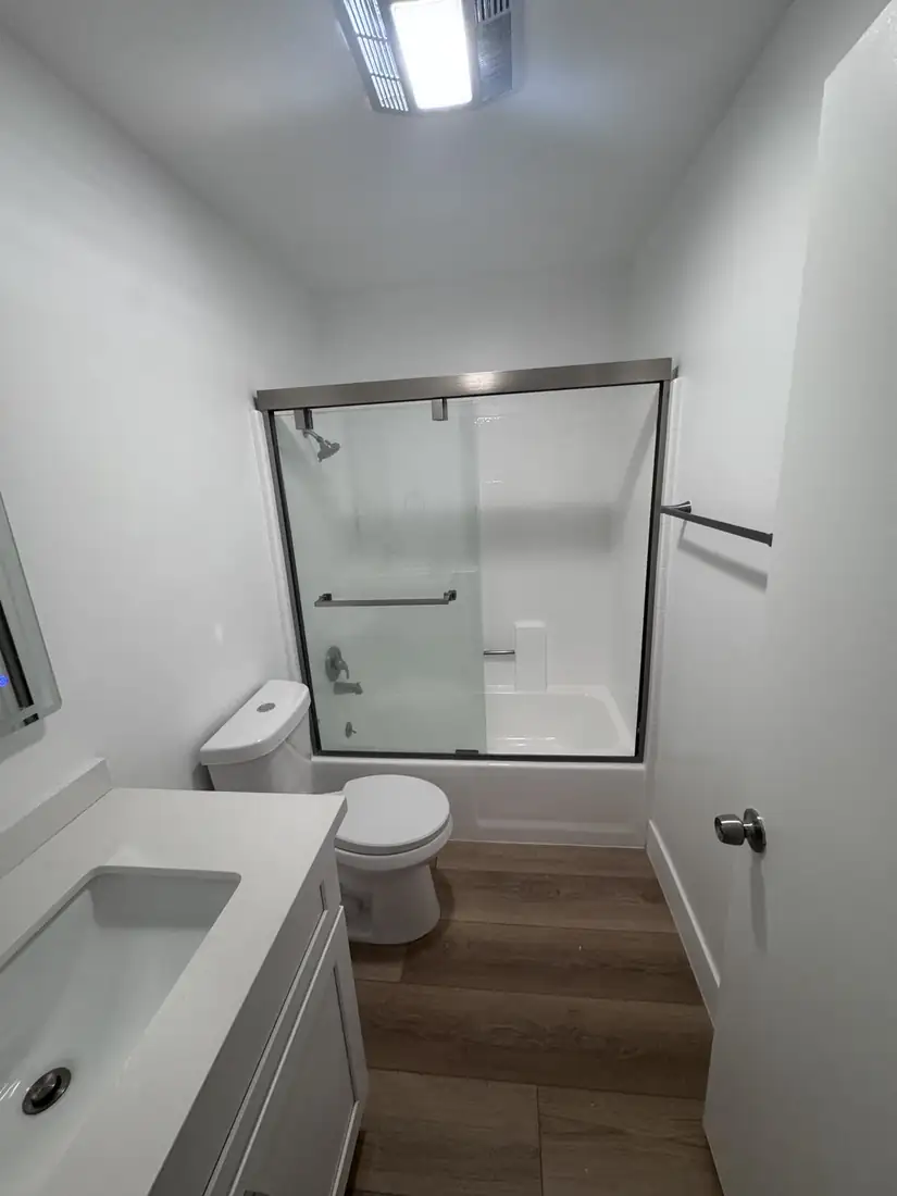 Hall bath, new tub surround and vanity