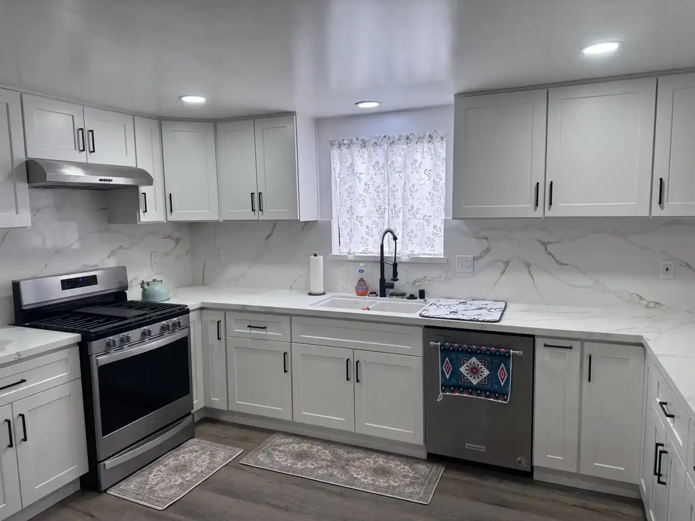 White shaker kitchen remodel by OD Building Development